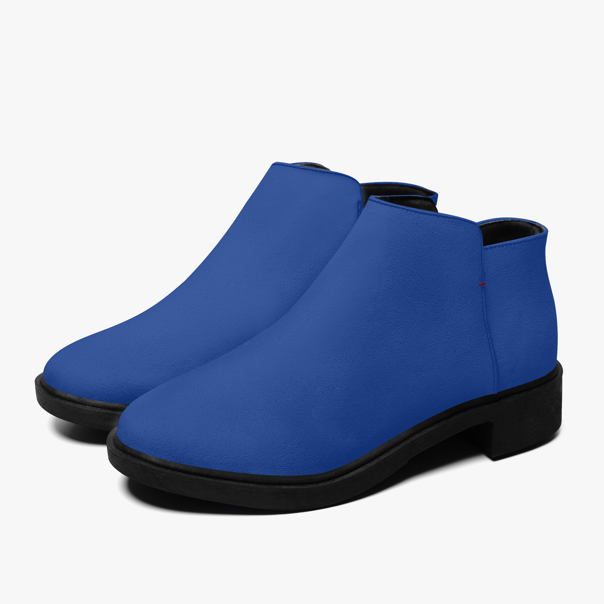 Royal blue suede ankle boot with gold zipper and black heel